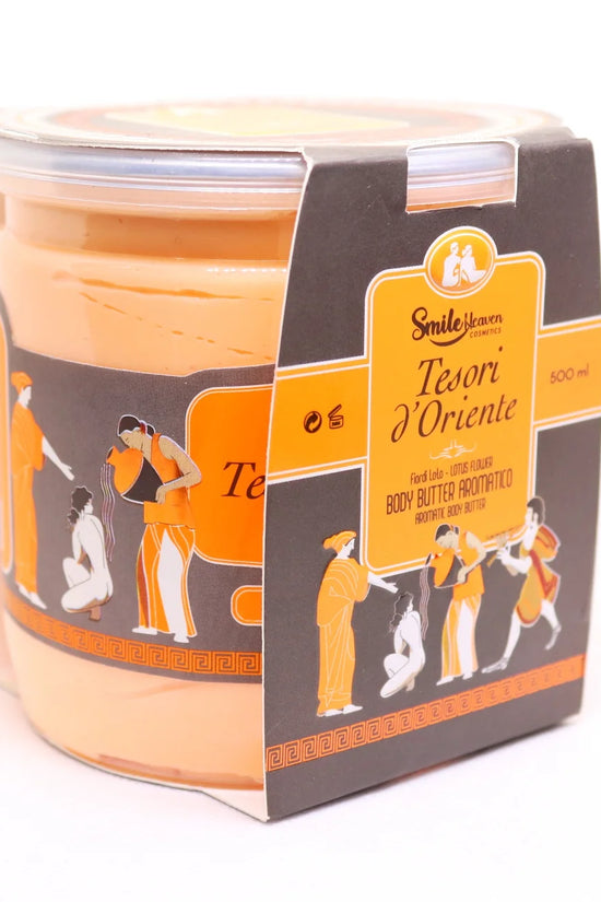 Candle in a decorative container with packaging featuring illustrations and text.