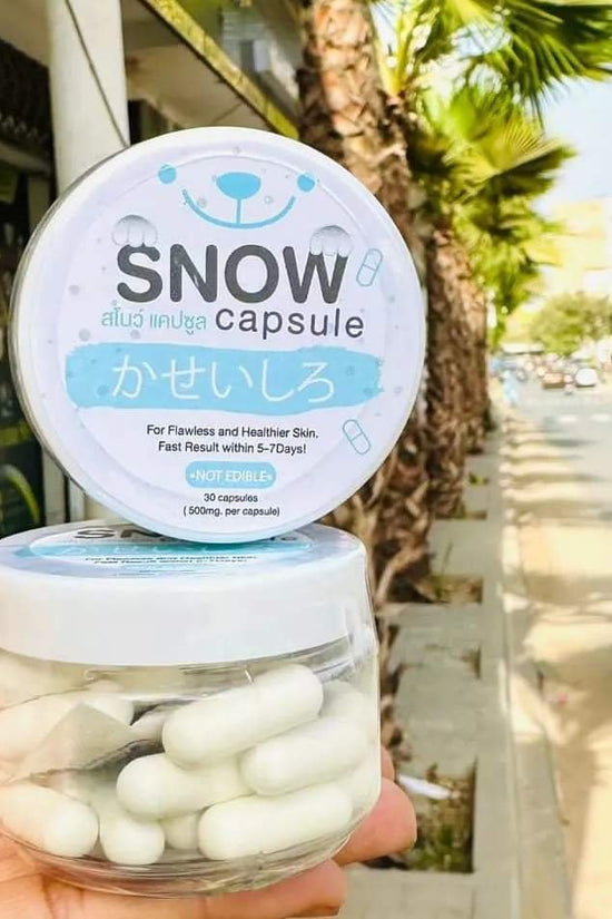 SNOW CAPSULE Arbutin Lightening Powder in a clear container, offering whitening capsules for glowing skin for healthier complexion