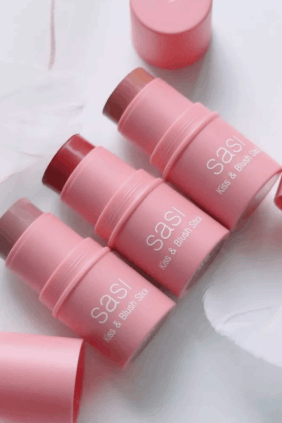Sasi Kiss & Blush Stick set featuring three vibrant shades in pink packaging, perfect for adding a rosy glow