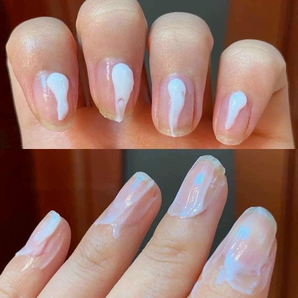 Vaseline hand and nail cream applied on freshly manicured nails, showcasing its moisturizing texture and shine.