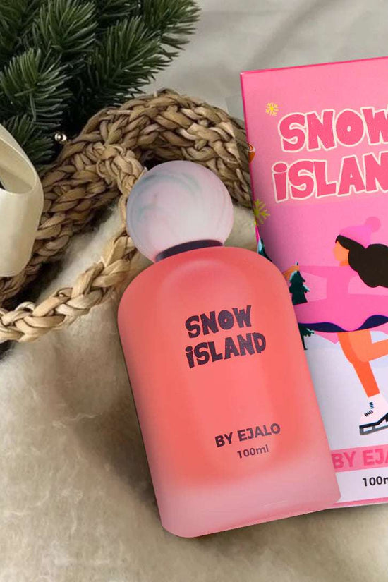 Snow Island perfume 100ml in pink bottle with stylish packaging, ideal for a refreshing fragrance experience.