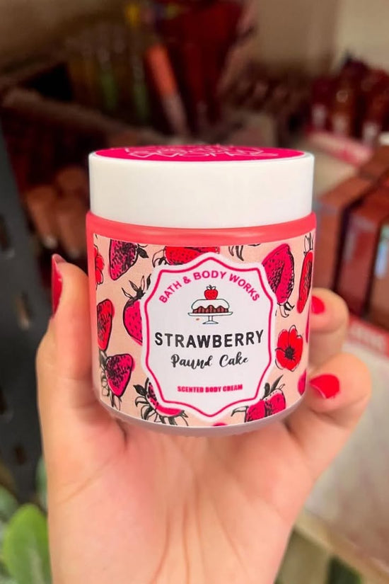 White Barn Strawberry Pound Cake candle from Bath & Body Works, featuring a bright design with strawberries and cake imagery