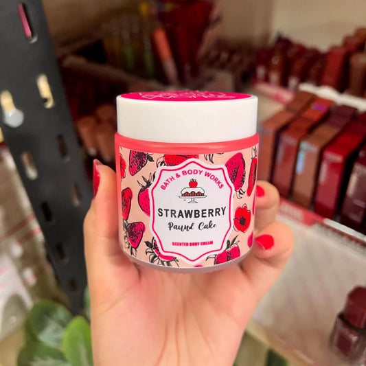 White Barn Strawberry Pound Cake candle from Bath & Body Works, featuring a bright design with strawberries and cake imagery