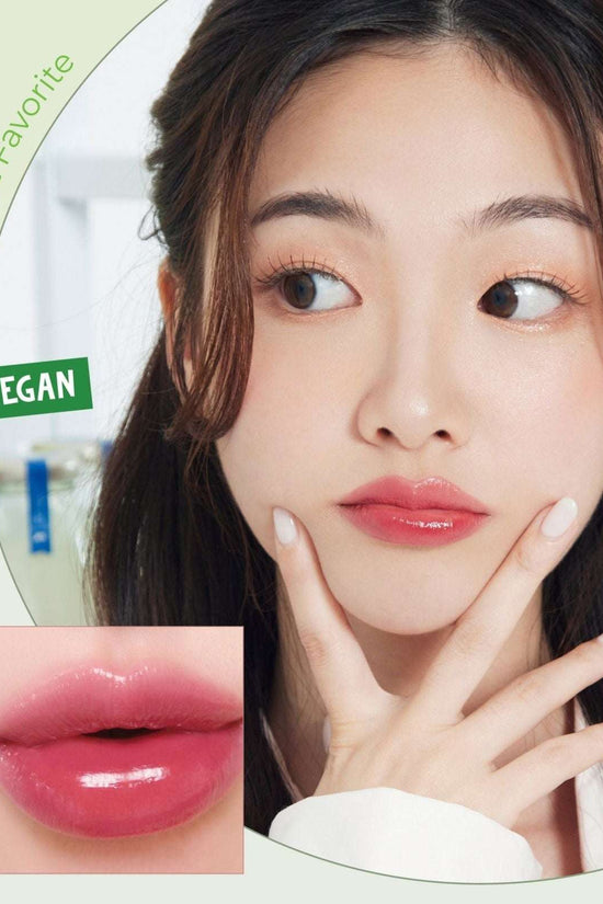 Model with glossy lips using 4U2 Serum Tint Oil Lip, showcasing a natural and vibrant shine in a vegan formula