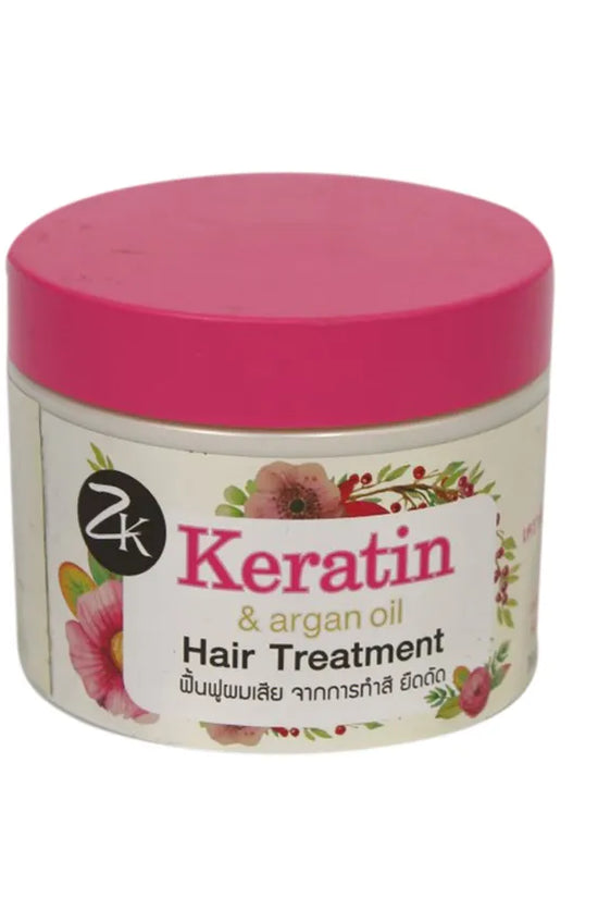 Keratin hair treatment with argan oil in a pink container, designed to nourish and revitalize hair.