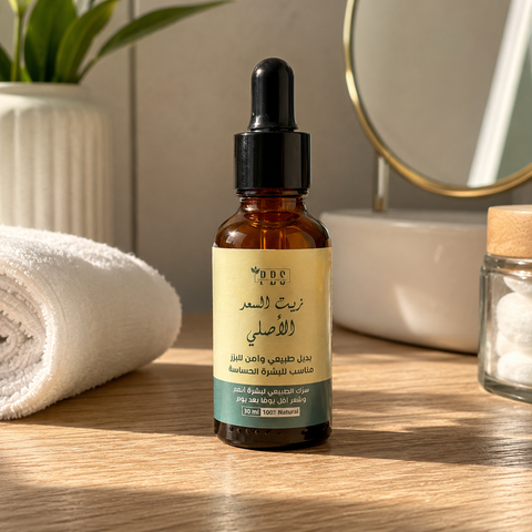 DDS Original Saad Oil 30ml – bathroom lifestyle shot with towel and mirror
