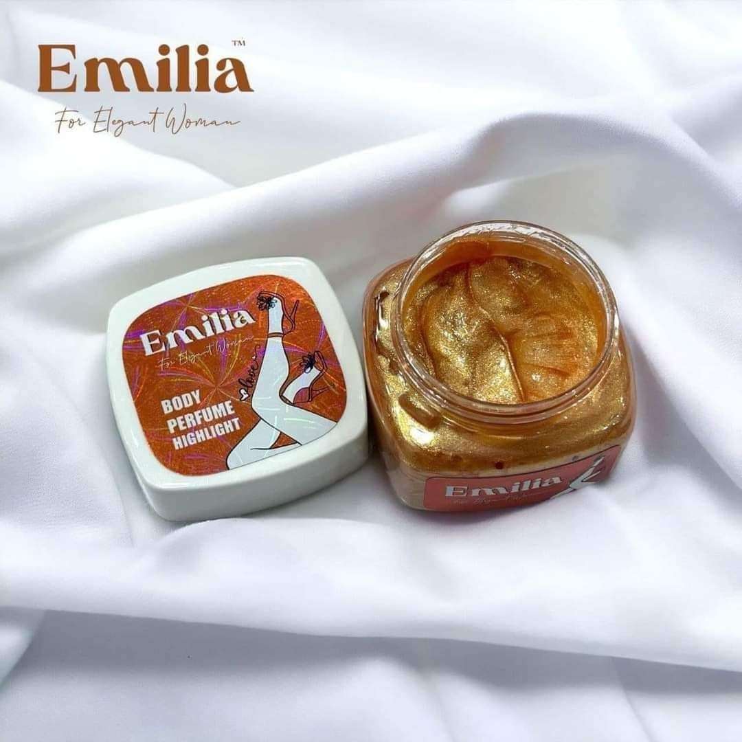 Emilia High Light body perfume in a charming jar showcasing golden shimmer, perfect for enhancing natural beauty.