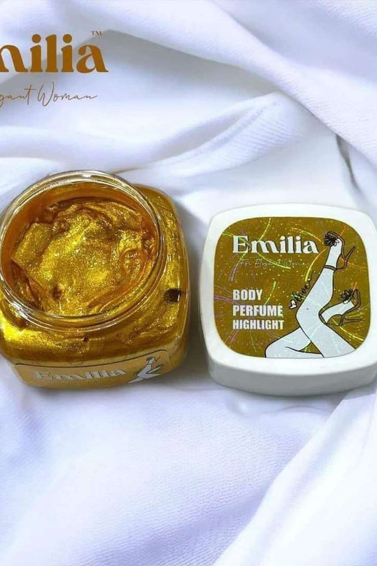 Emilia High Light body perfume in a golden jar with elegant branding against a white background, perfect for a luxurious glow