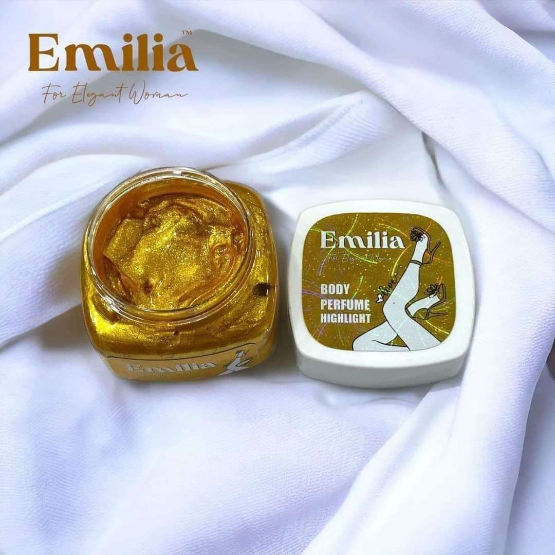 Emilia High Light body perfume in a golden jar with elegant branding against a white background, perfect for a luxurious glow