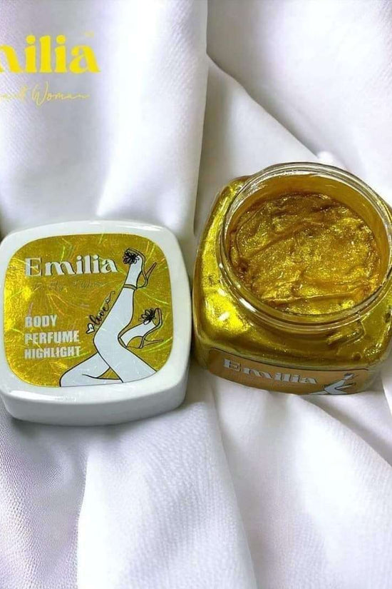 Emilia High Light body perfume in a golden jar with luxurious packaging, perfect for enhancing natural glow.