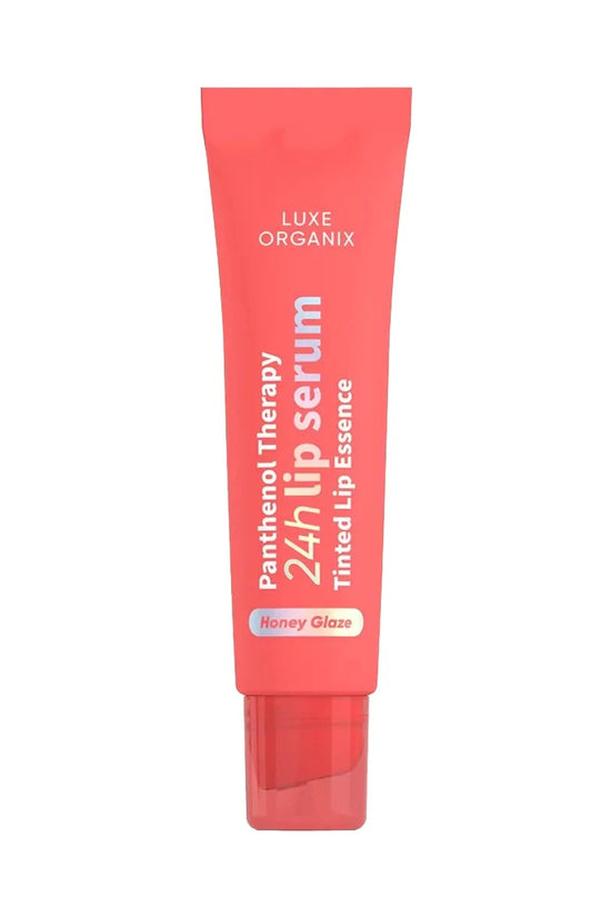 Luxe Organix lip serum in tinted Honey Glaze, featuring a sleek tube design for hydration and color enhancement