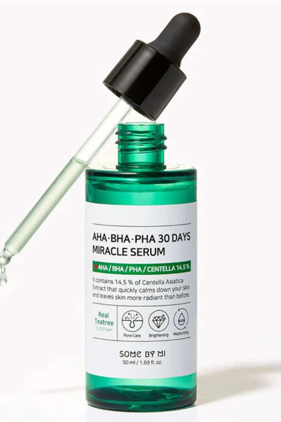 SOME BY MI AHA BHA PHA serum in a green bottle with dropper, promoting skin luminosity and hydration.