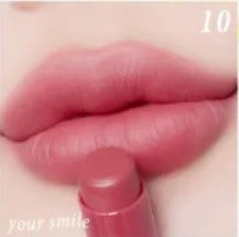 Close-up of lips wearing 4U2 You're Mine Powder Lipstick in a soft pink shade for a natural look