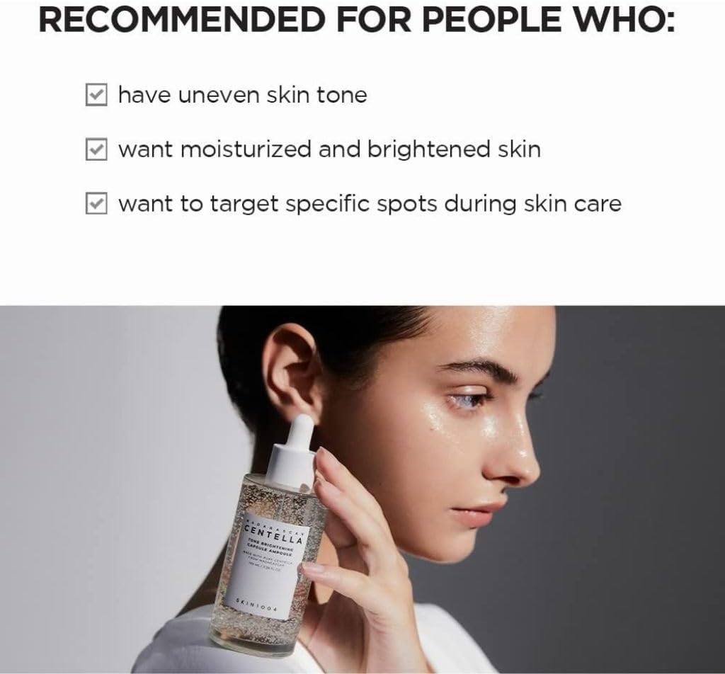 Skin1004 Centella ampoule in a dropper bottle, promoting moisturized and brightened skin for uneven tones