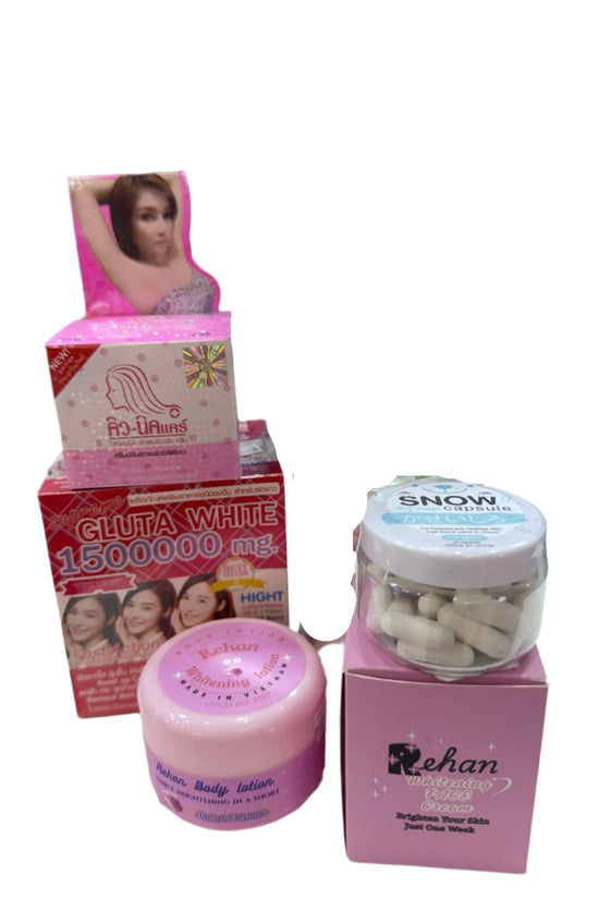 Collection of beauty and skincare products on a table with a blurred background