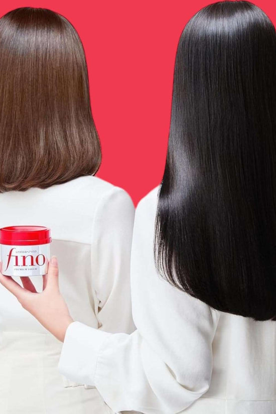 Fino hair mask Japan displayed on a woman's hand with shiny, healthy hair in the background