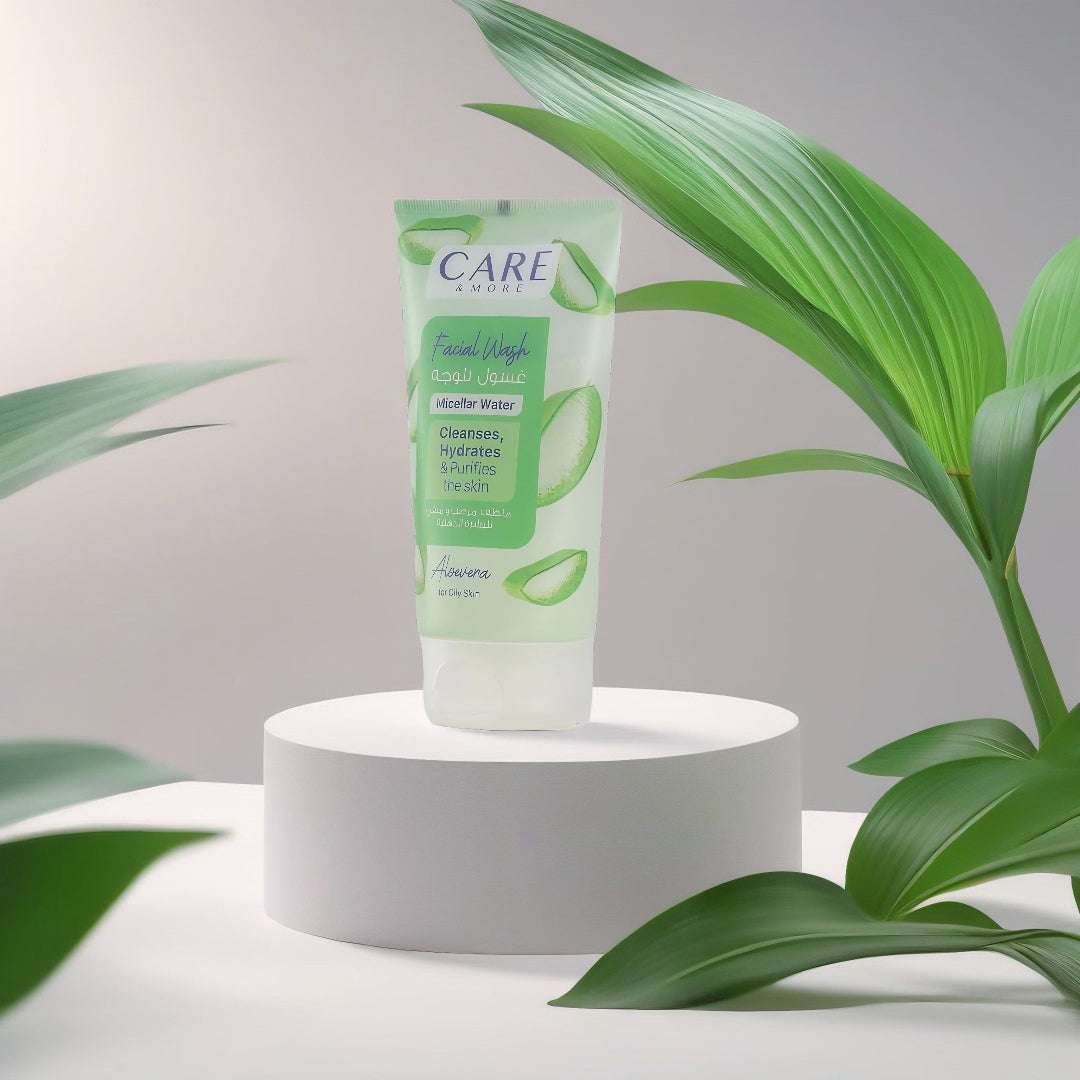 CAREMORE Aloe Vera facial wash for oily skin in a stylish tube, displayed with green leaves for a fresh look