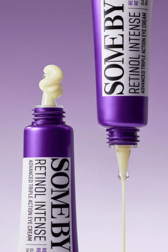 Advanced retinol eye cream for dark circles in a tube with a creamy texture and purple packaging
