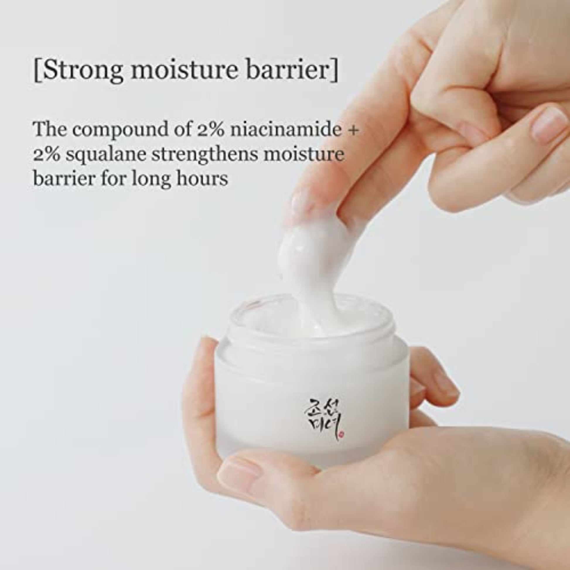 Beauty of Joseon cream in a jar with a hand applying the moisturizer, emphasizes hydration and skincare benefits