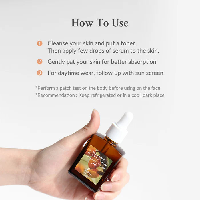 DR Althea Vitamin C Boosting Serum with instructions for use on brightening skin in hand