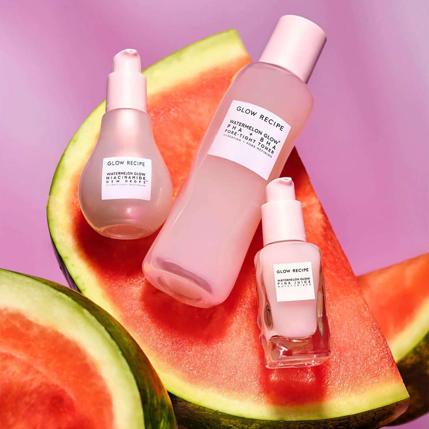 Glow Recipe Dewy Skin Kit featuring Watermelon Glow Niacinamide Dew Drops, PHA+AHA Toner, and Pink Juice Moisturizer