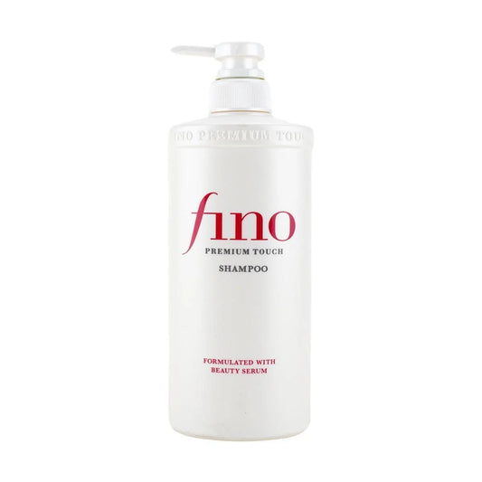 Fino Premium Touch Moist Shampoo in a sleek white bottle with a pump, designed for luxurious hair care and enriched with beauty serum.