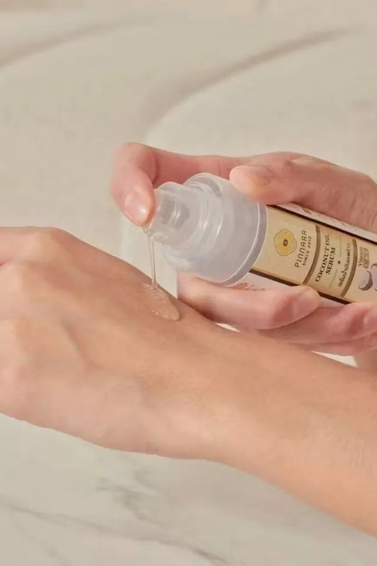 Organic coconut oil applied to skin, showcasing the best coconut oil for moisturizing with unrefined, cold-pressed quality.