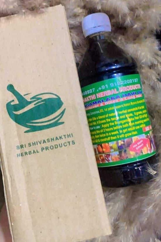 SRI SHVASHKIthi hair oil 500ml in a dark bottle with a natural herb formulation label for healthy hair care