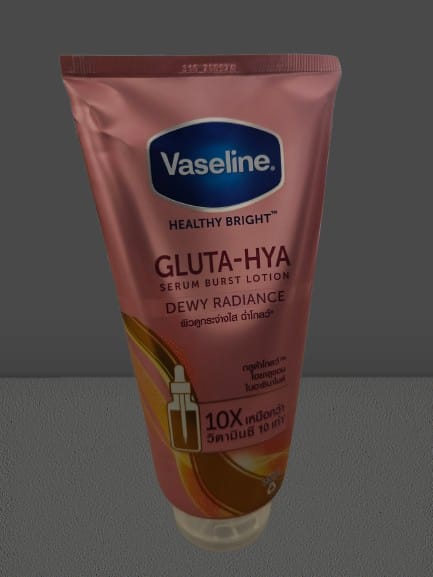 Vaseline Gluta-Hya lotion in a pink tube for dewy radiant skin with serum burst formula